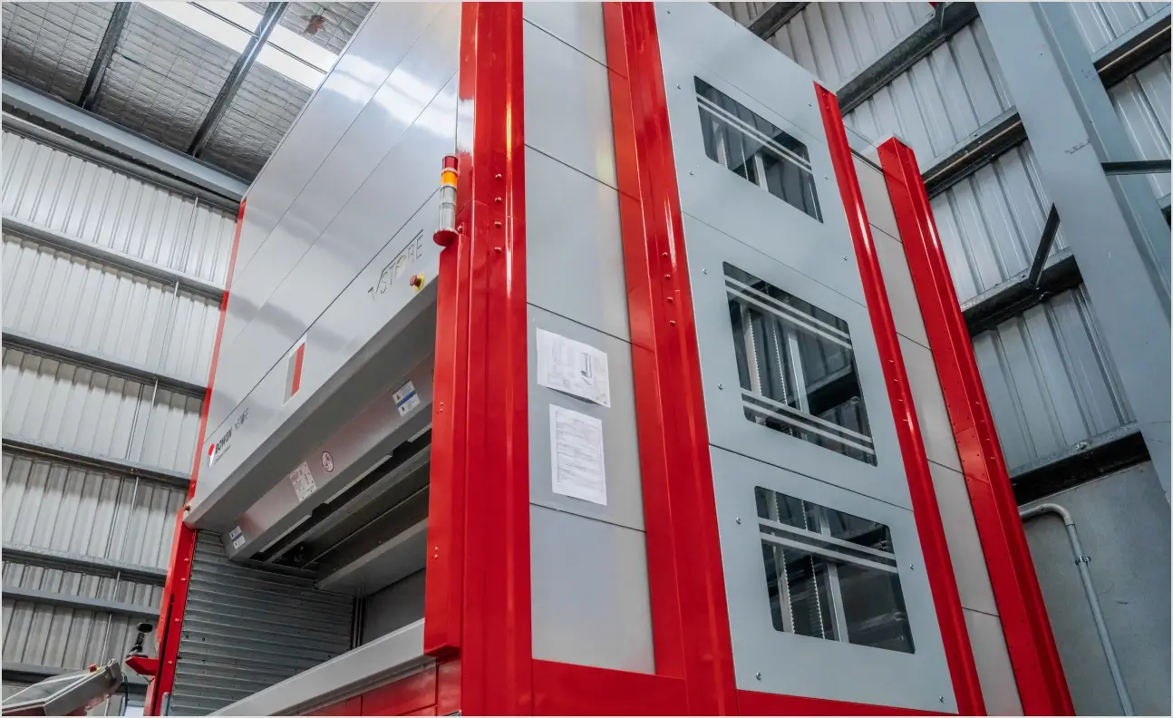 Automated vertical storage unit for space-saving inventory management and efficient warehouse storage